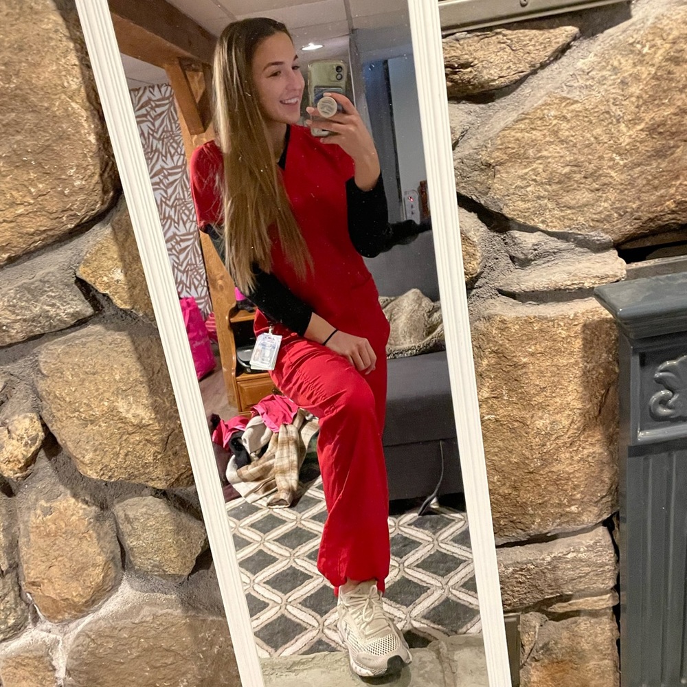 Red scrub set. Top and bottom size small.